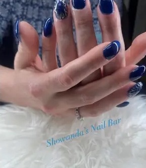 Showanda's recent work: deep blue nails with accent detail