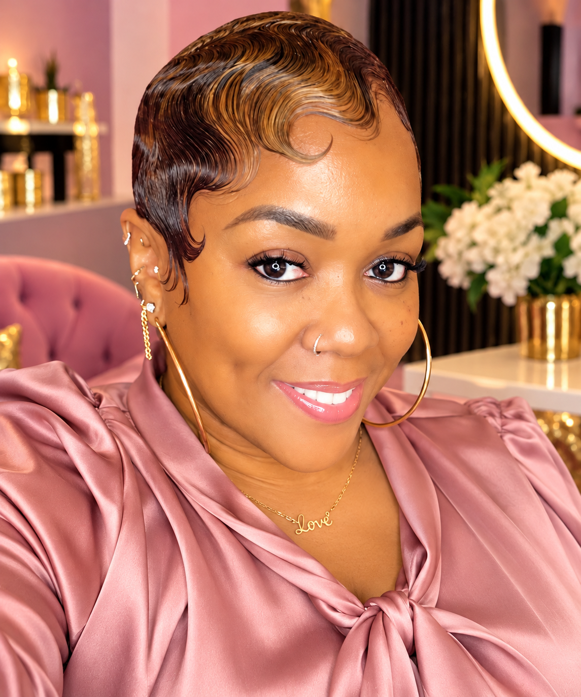 Showanda, owner of Showanda’s Nail Bar, smiling in her salon