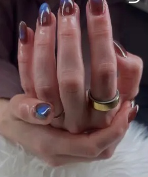 Showanda's recent work: plum and blue cat-eye nails