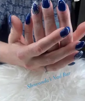 Showanda's recent work: deep blue nails with accent detail